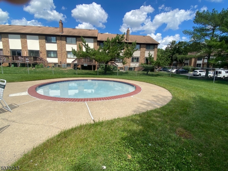 73 Farm Road Hillsborough, NJ 08844 - Photo 19 of 26 a view of a house with a swimming pool
