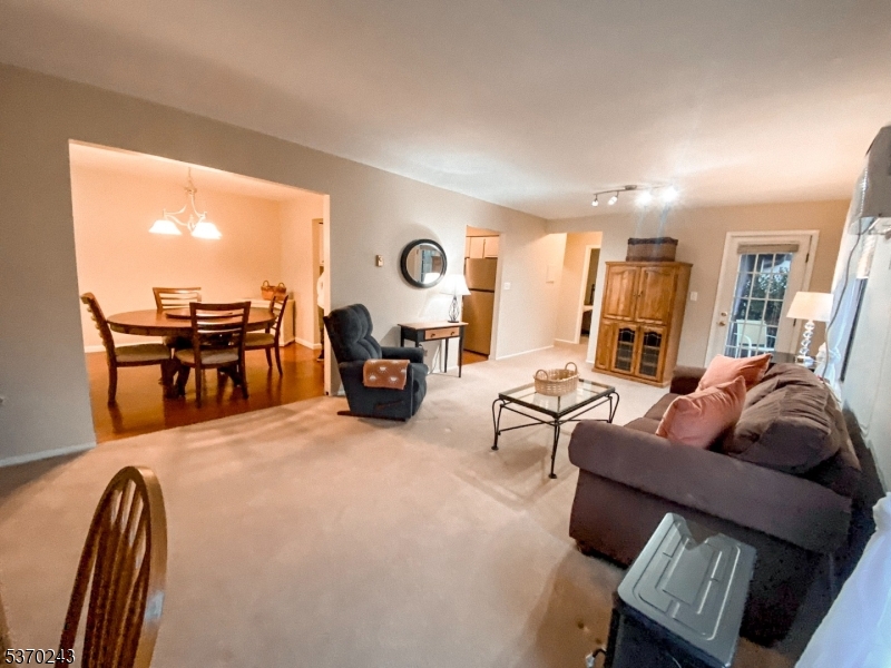 73 Farm Road Hillsborough, NJ 08844 - Photo 5 of 26 a living room with furniture and a large window