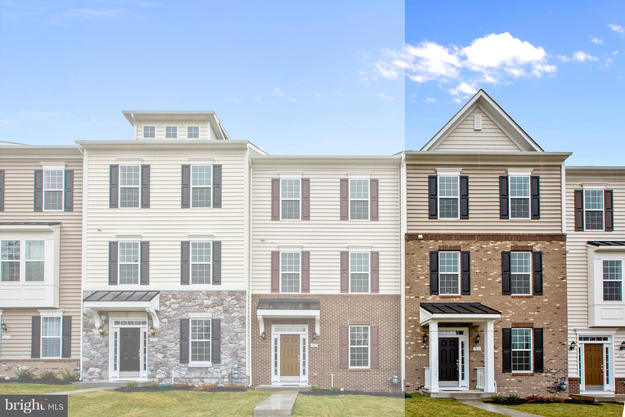 7871 Wormans Mill Road Frederick, MD 21701 - Photo 2 of 30 a front view of a residential apartment building with a yard