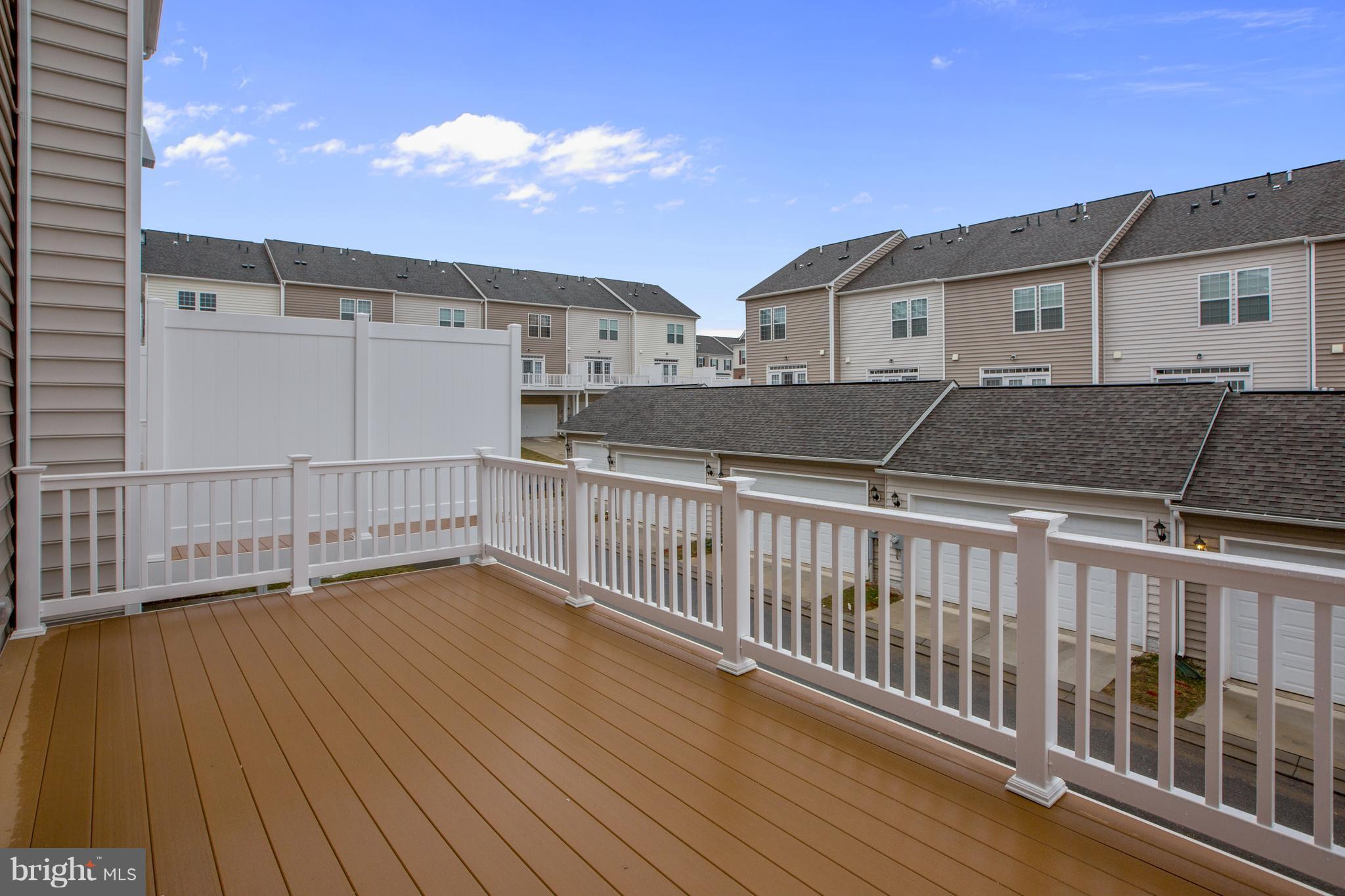 7871 Wormans Mill Road Frederick, MD 21701 - Photo 15 of 30 a view of a house with wooden deck