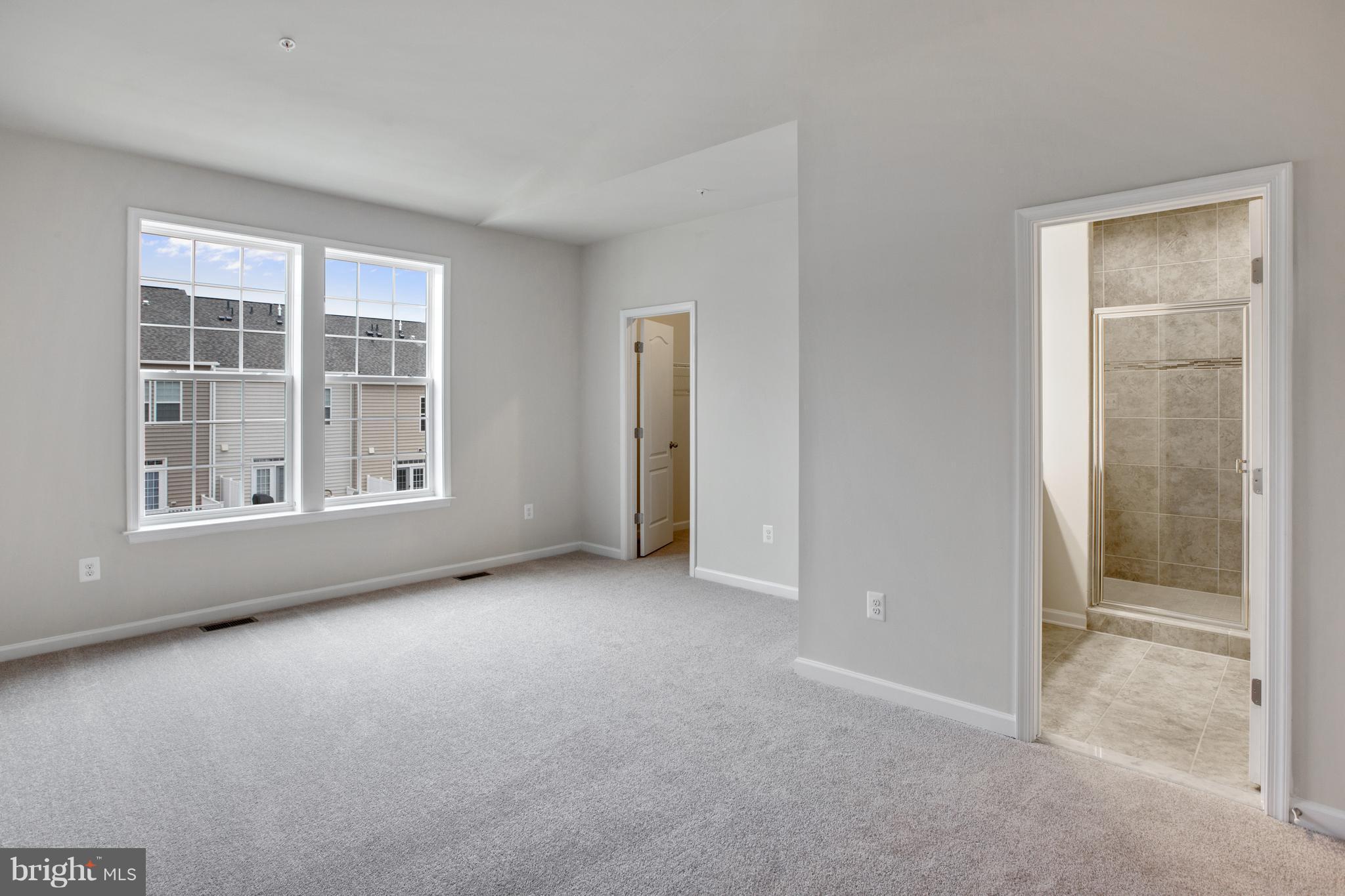 7871 Wormans Mill Road Frederick, MD 21701 - Photo 17 of 30 an empty room with windows
