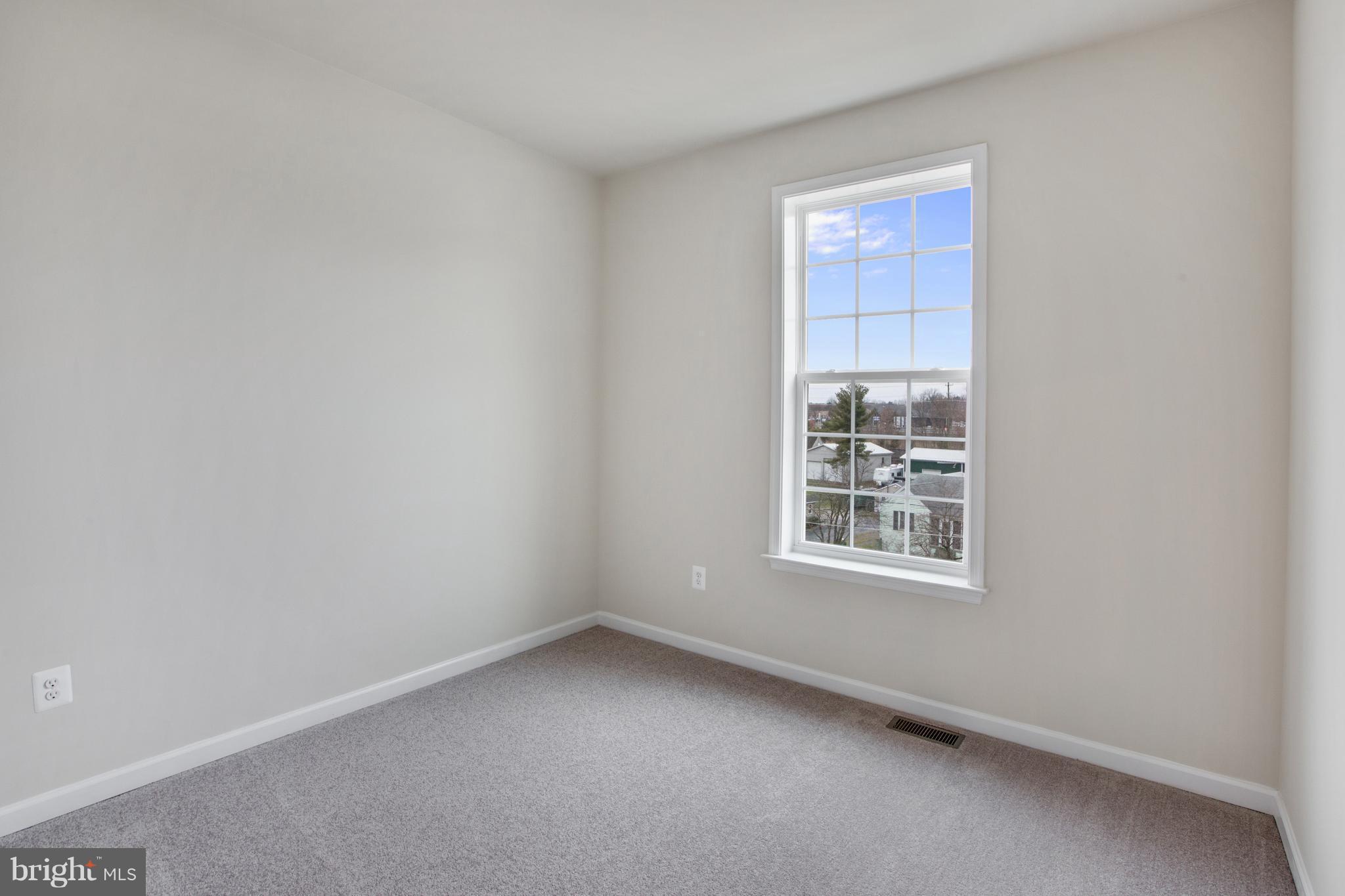 7871 Wormans Mill Road Frederick, MD 21701 - Photo 21 of 30 an empty room with a window