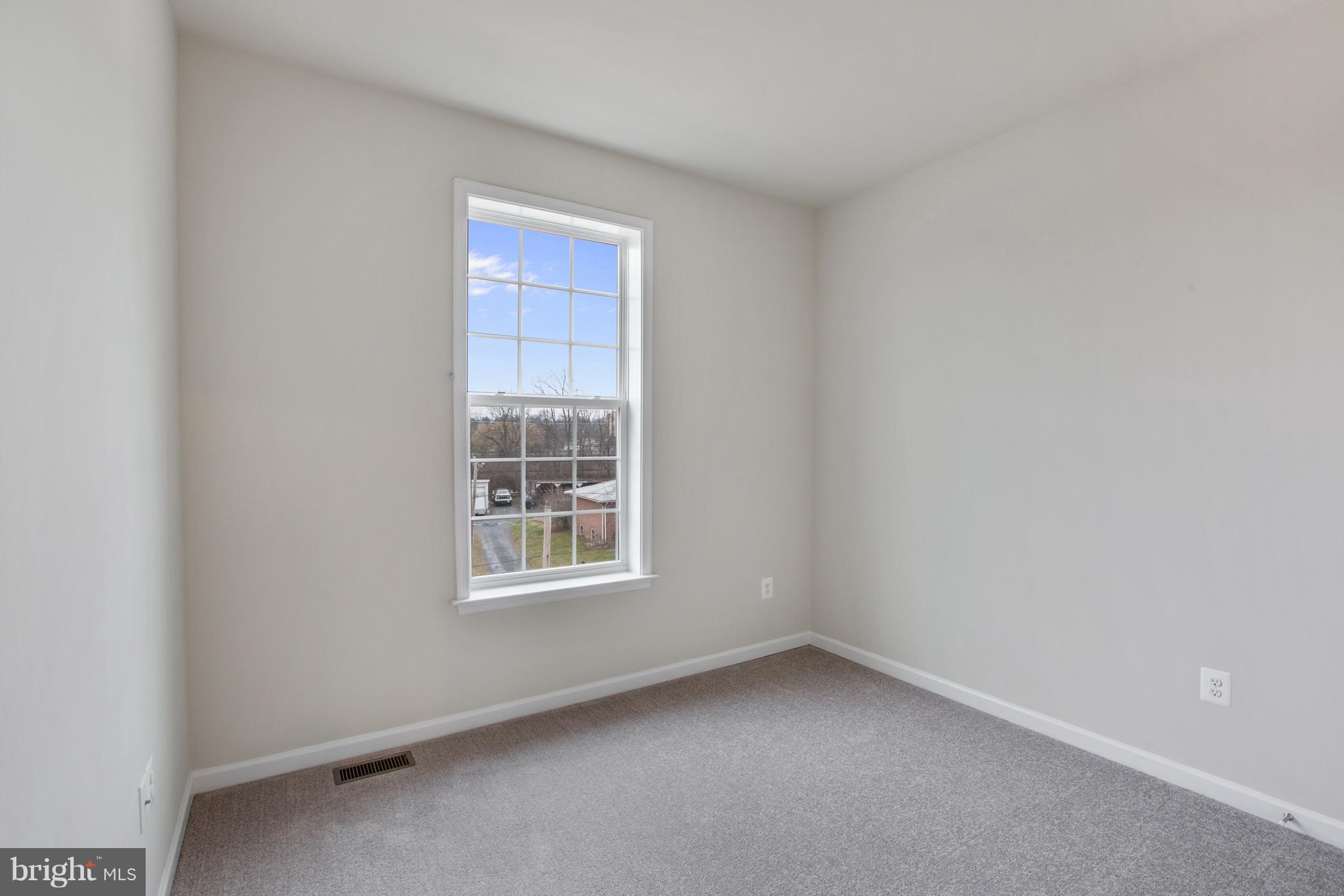 7871 Wormans Mill Road Frederick, MD 21701 - Photo 23 of 30 an empty room with a window