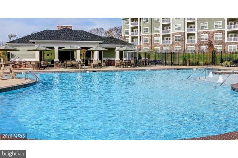 7871 Wormans Mill Road Frederick, MD 21701 - Photo 29 of 30 a swimming pool view with a outdoor seating