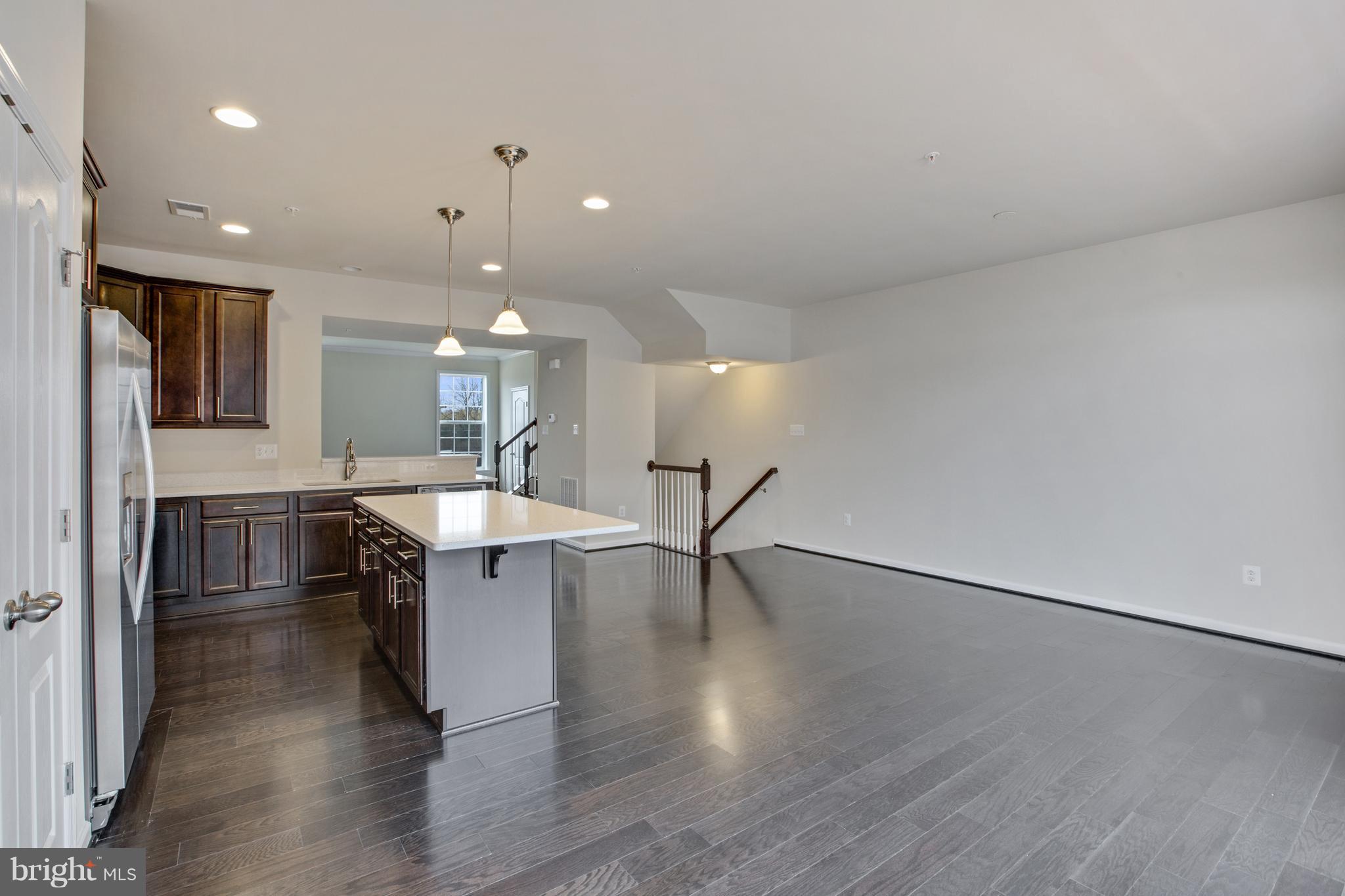 7871 Wormans Mill Road Frederick, MD 21701 - Photo 8 of 30 an open kitchen with breakfast area
