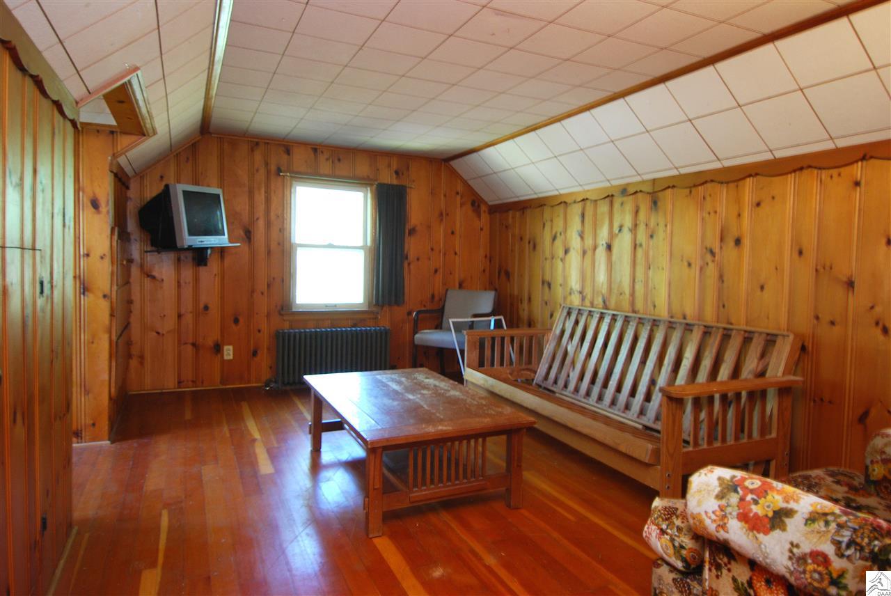 4101 London Road Duluth, MN 55804 - Photo 8 of 12 Knotty Pine, built-in dresser and closets, fir hardwood floors, 1/2 bath with room to expand & offic