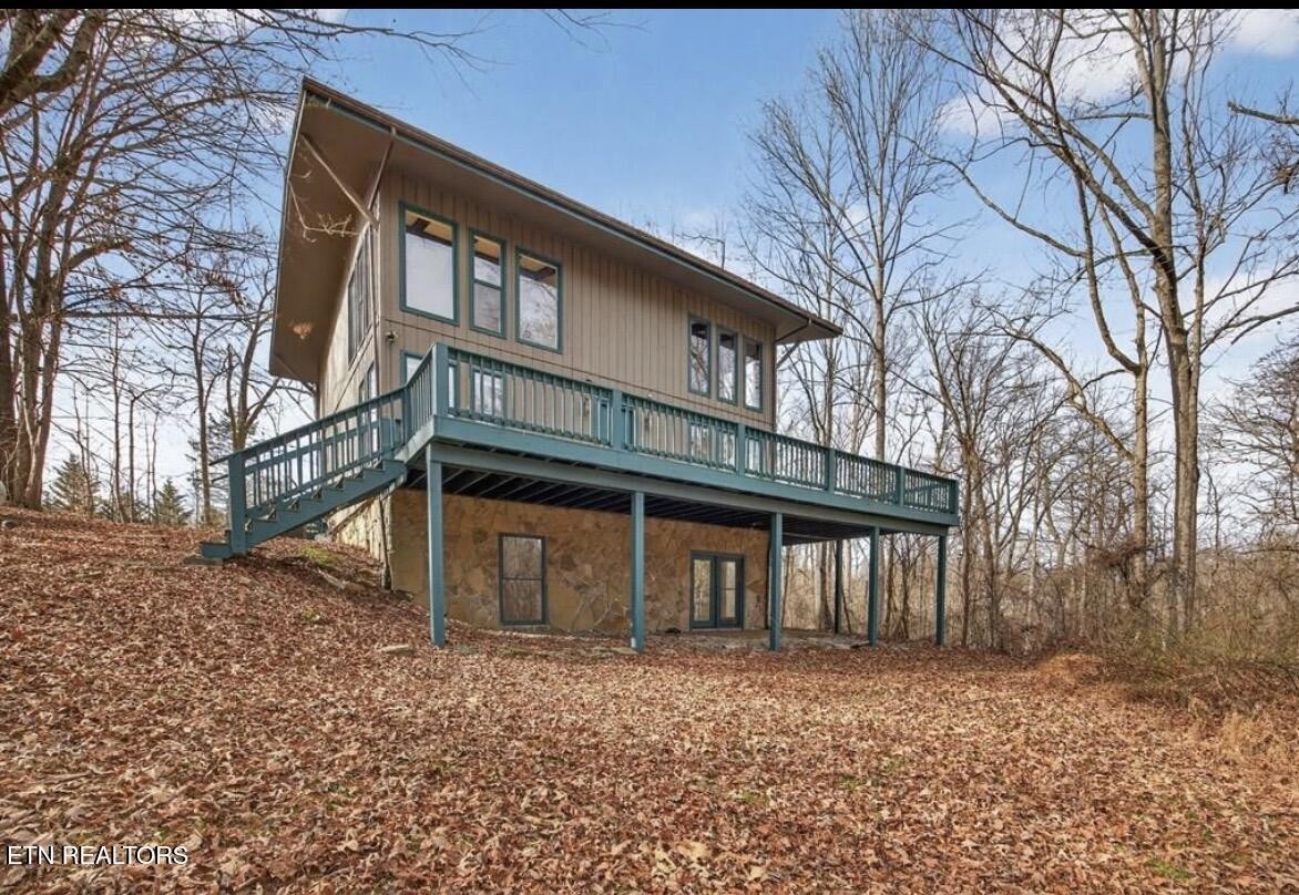 2400 Burgess Falls Road Cookeville, TN 38506 - Photo 2 of 41 a front view of a house with a yard