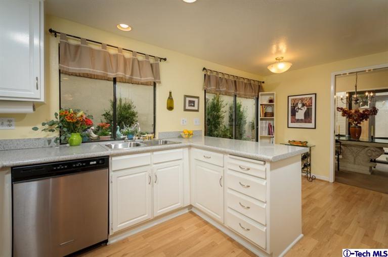 1445 Valley View Road, Unit 5 Glendale, CA 91202 - Photo 14 of 19 a kitchen with a refrigerator and sink