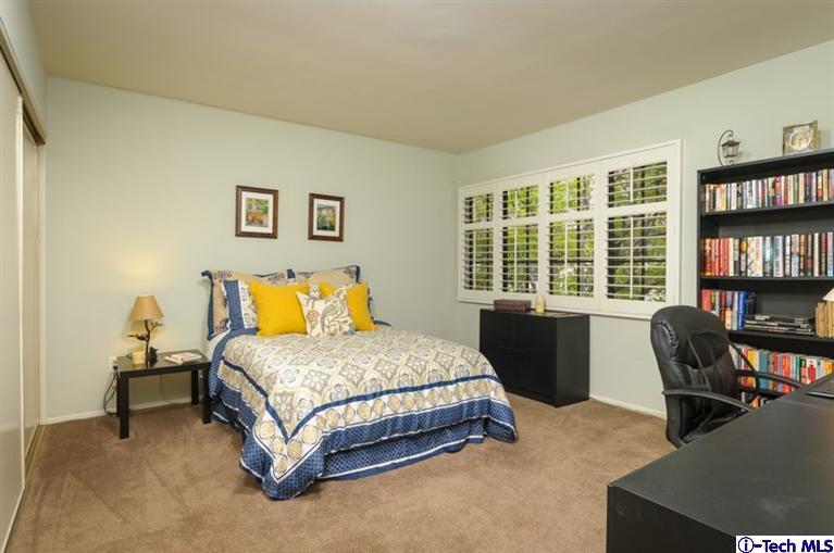 1445 Valley View Road, Unit 5 Glendale, CA 91202 - Photo 17 of 19 a bedroom with a bed work place and a couch