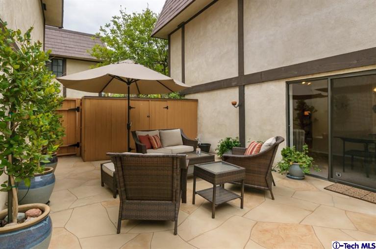 1445 Valley View Road, Unit 5 Glendale, CA 91202 - Photo 4 of 19 a backyard of a house with table and chairs