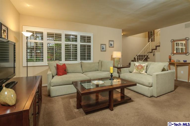 1445 Valley View Road, Unit 5 Glendale, CA 91202 - Photo 9 of 19 a living room with furniture and a large window