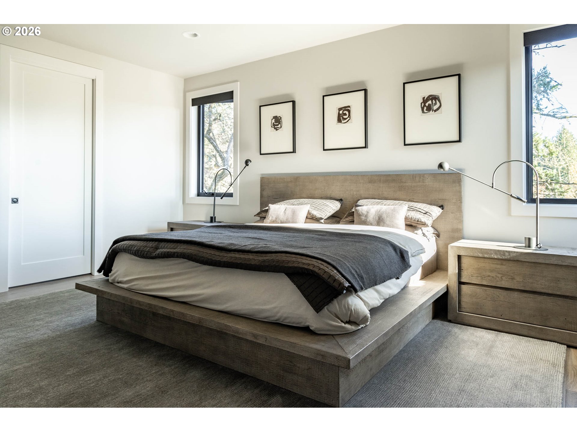 4560 Southwest 59th Avenue Portland, OR 97221 - Photo 24 of 30 a bedroom with a bed and window