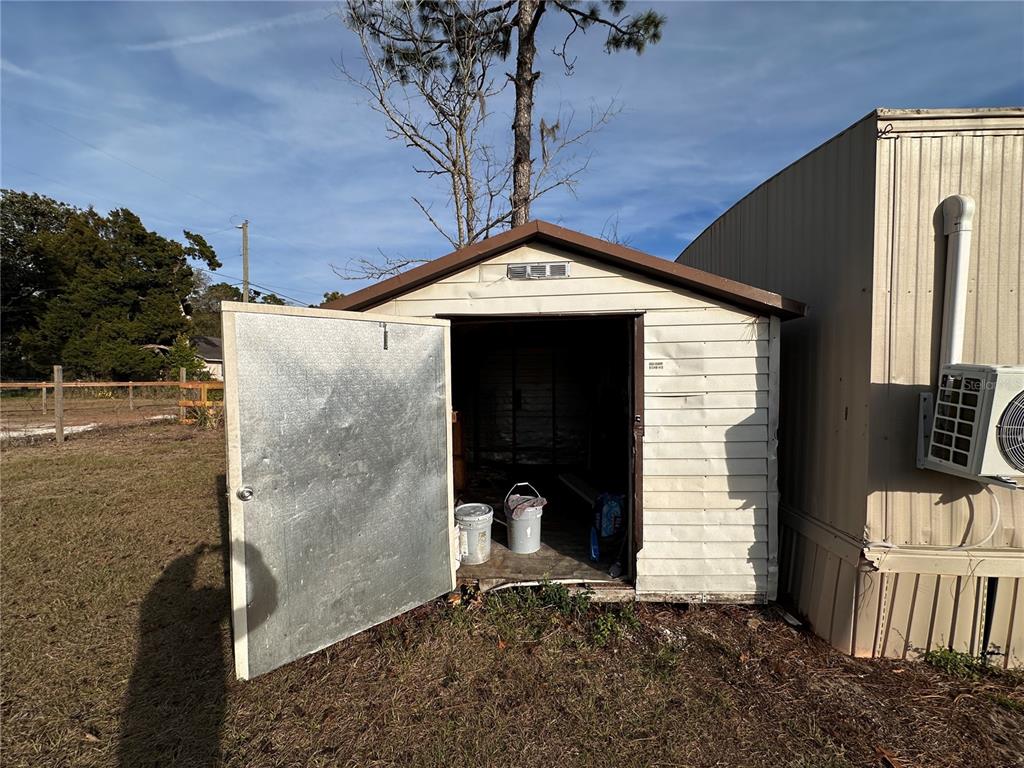 16083 Naples Street Brooksville, FL 34604 - Photo 9 of 16 a view of a door of the house