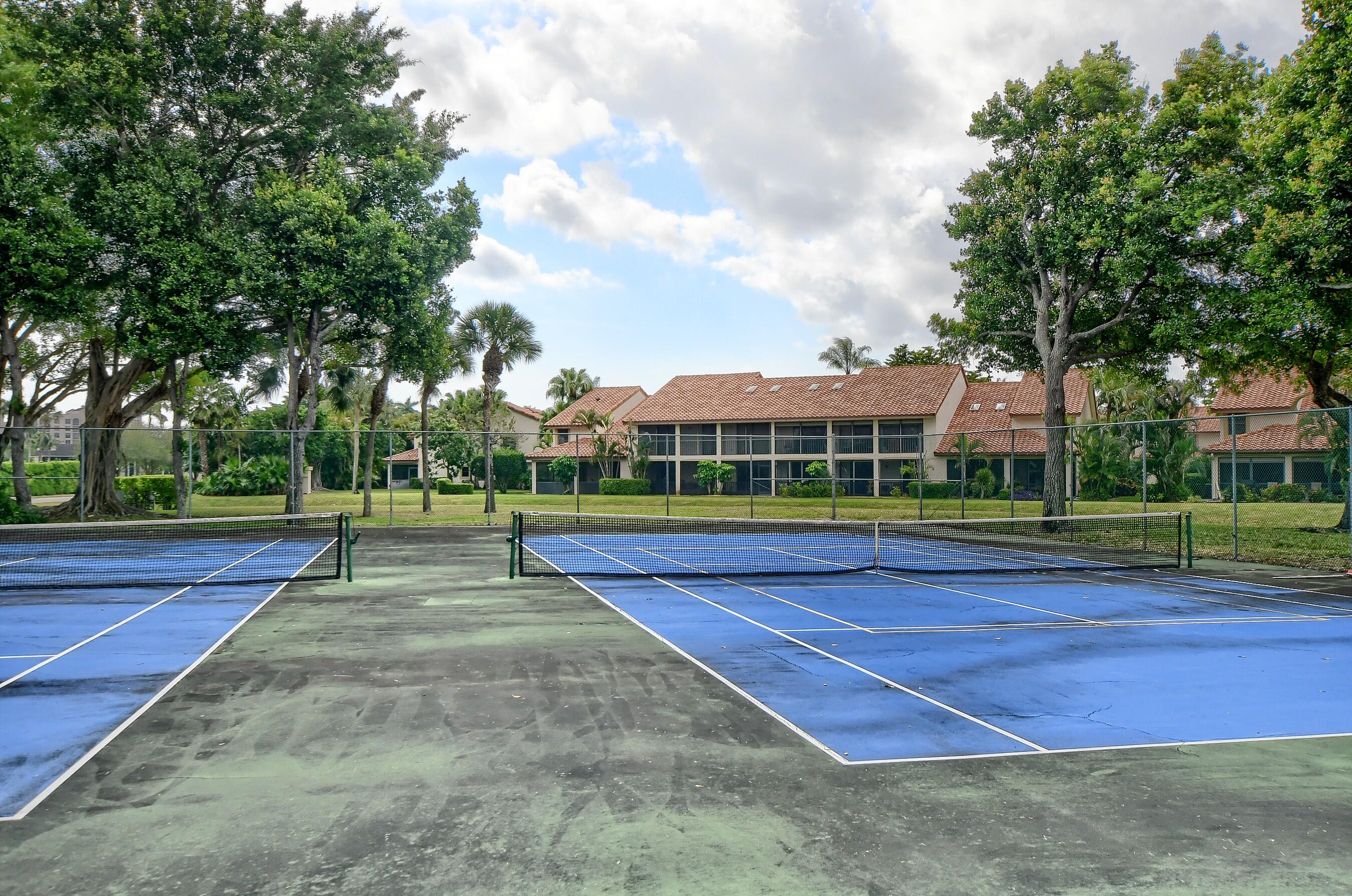 7896 Seville Place, Unit 1501 Boca Raton, FL 33433 - Photo 32 of 32 a view of a tennis court