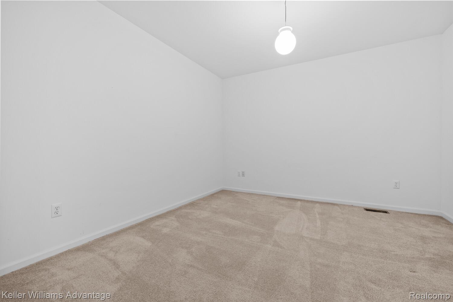 4100 Norwich Court Rochester, MI 48306 - Photo 39 of 72 Spare room featuring light colored carpet and baseboards