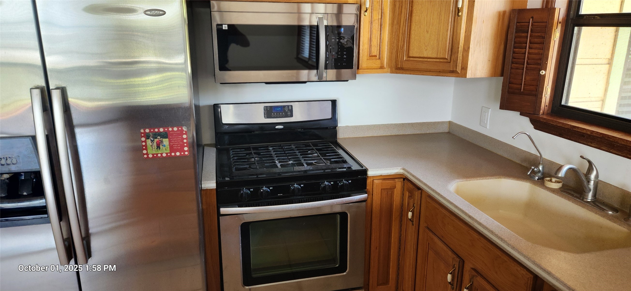 121 North Point Drive North Trinity, TX 75862 - Photo 21 of 37 a kitchen with stainless steel appliances granite countertop a refrigerator stove and microwave