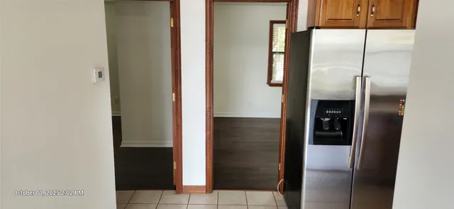 a bathroom with a glass door shower