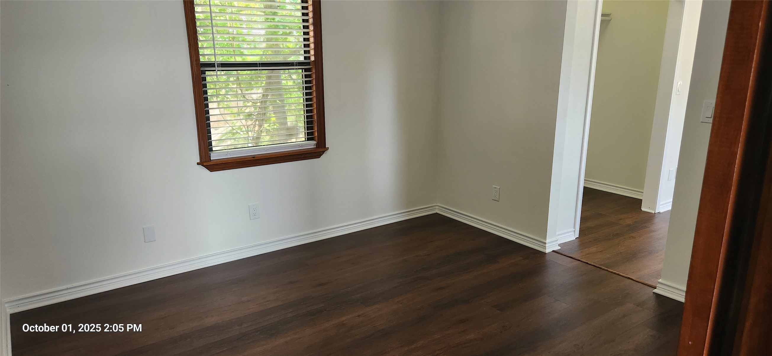 121 North Point Drive North Trinity, TX 75862 - Photo 28 of 37 an empty room with wooden floor and windows
