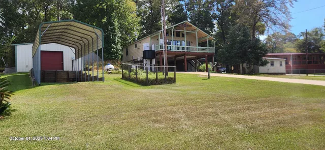 a front view of house with a yard
