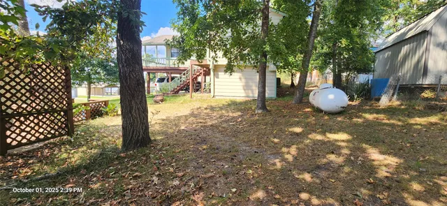 a view of a outdoor space and a tree