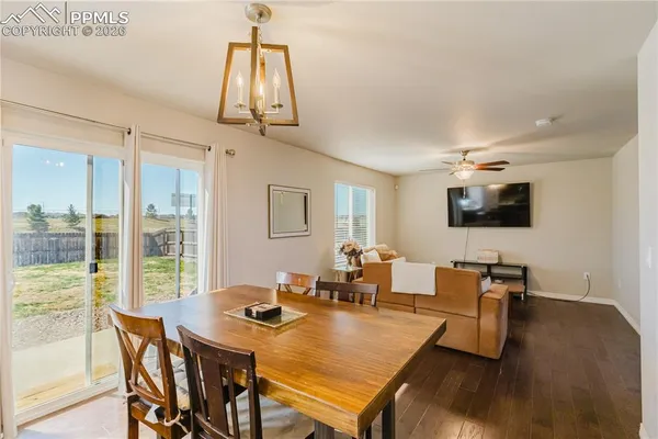 a kitchen with a sink stove and microwave