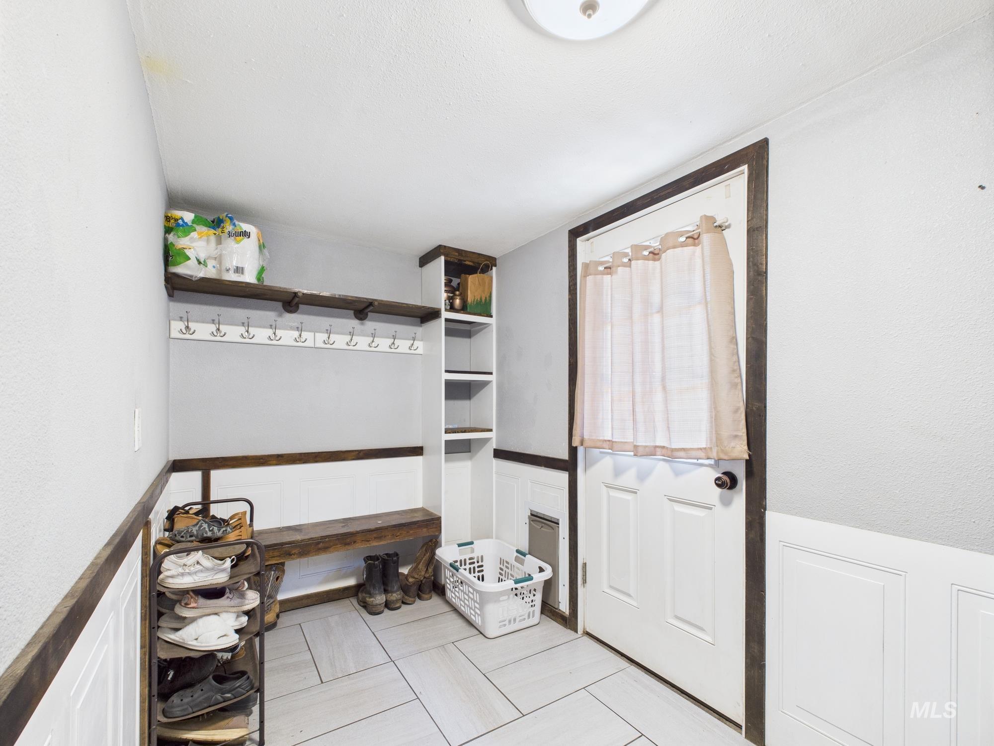 1428 Bryden Avenue Lewiston, ID 83501 - Photo 14 of 32 Mudroom featuring wainscoting