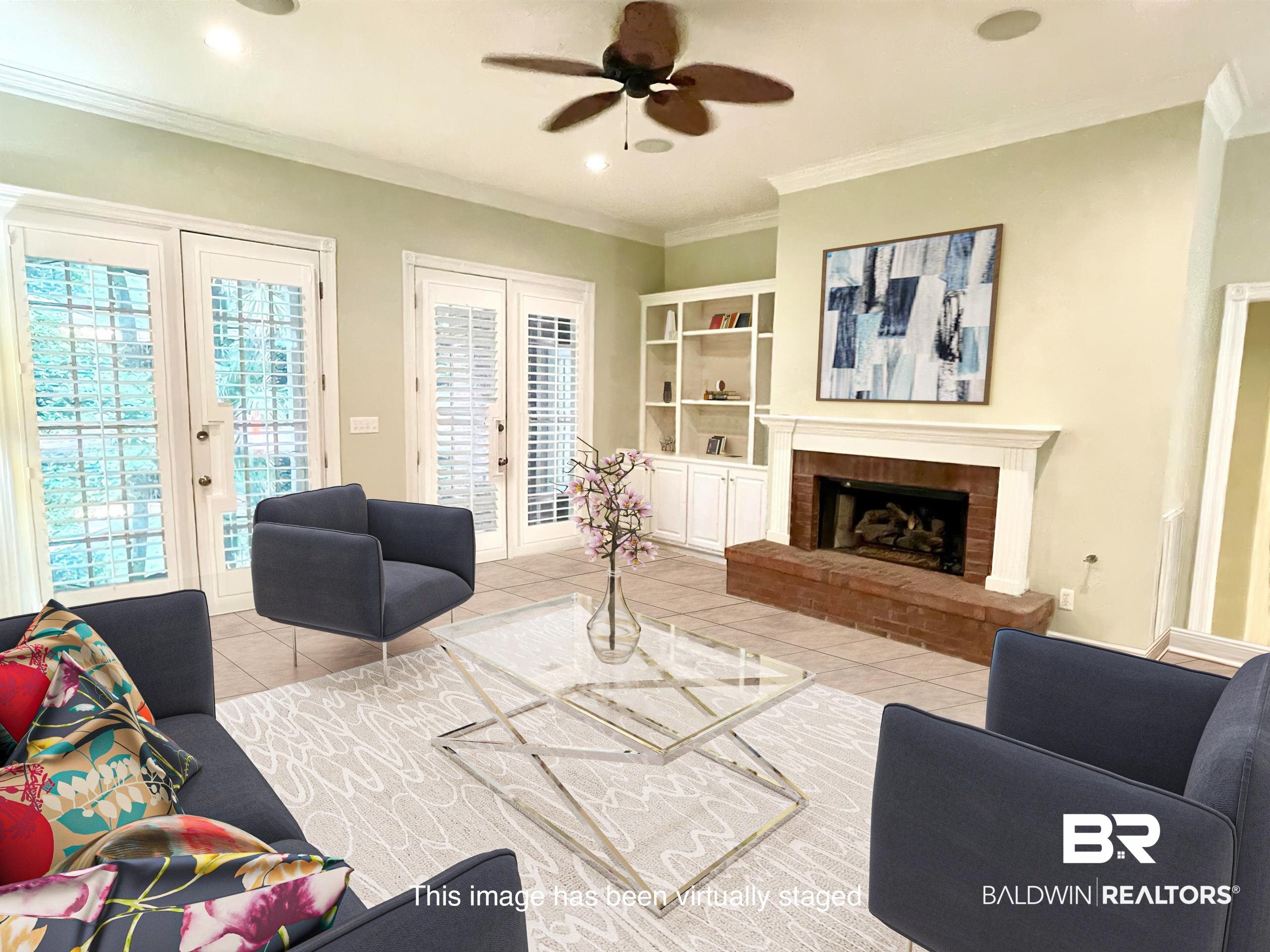 202 Potters Mills Road Daphne, AL 36526 - Photo 4 of 29 Tiled living room with french doors, a fireplace, ornamental molding, and ceiling fan
