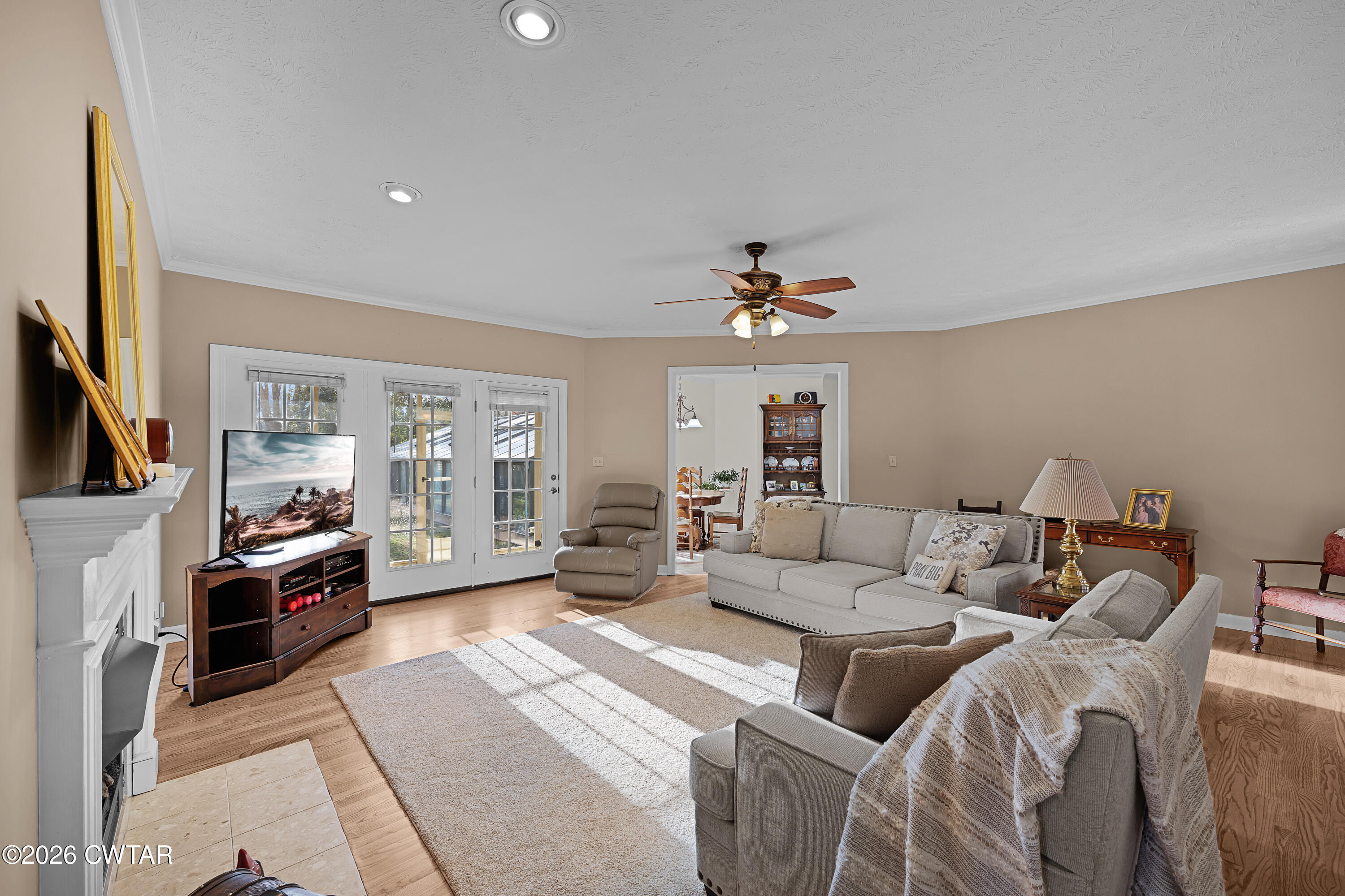 129 Pepper Tree Road Jackson, TN 38305 - Photo 11 of 35 a living room with furniture and a flat screen tv