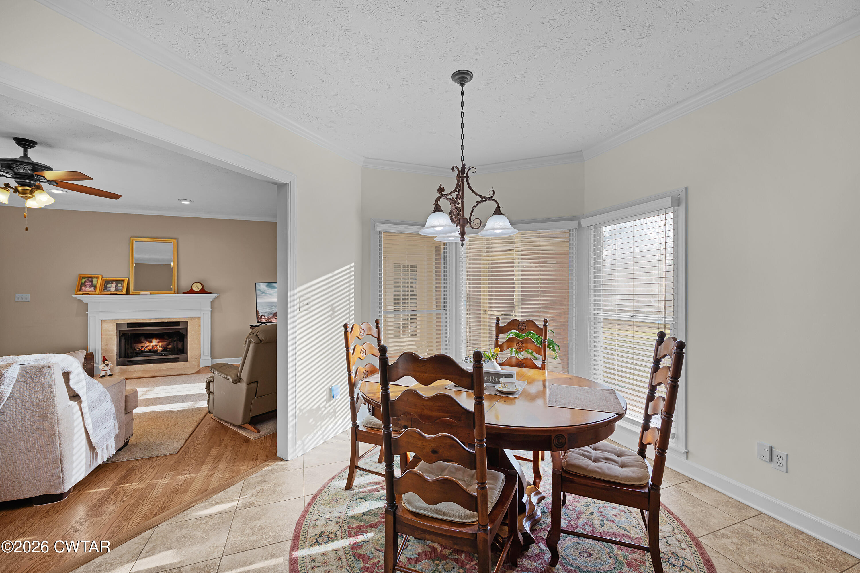 129 Pepper Tree Road Jackson, TN 38305 - Photo 12 of 35 a view of a dining room with furniture window and wooden floor