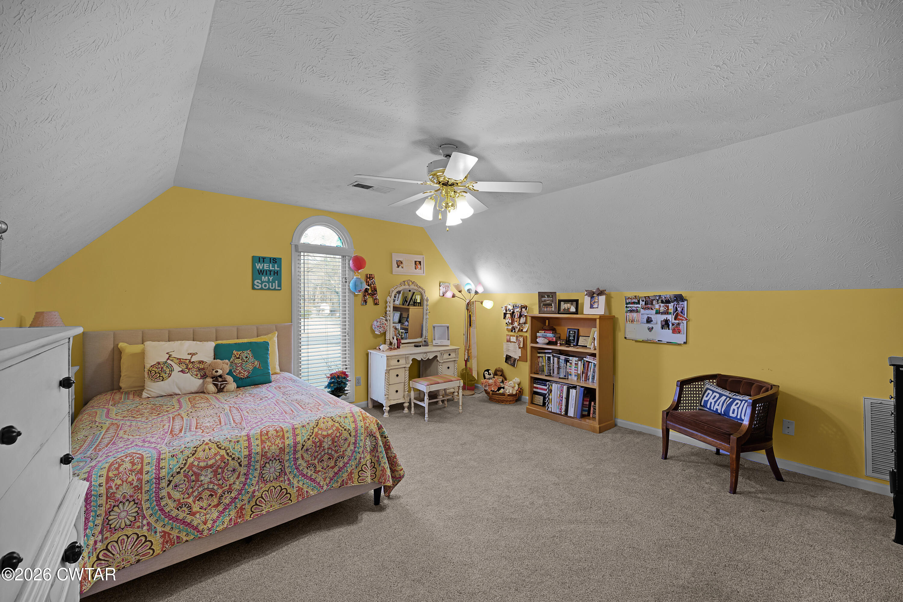 129 Pepper Tree Road Jackson, TN 38305 - Photo 27 of 35 a bedroom with a bed a furniture and a chandelier