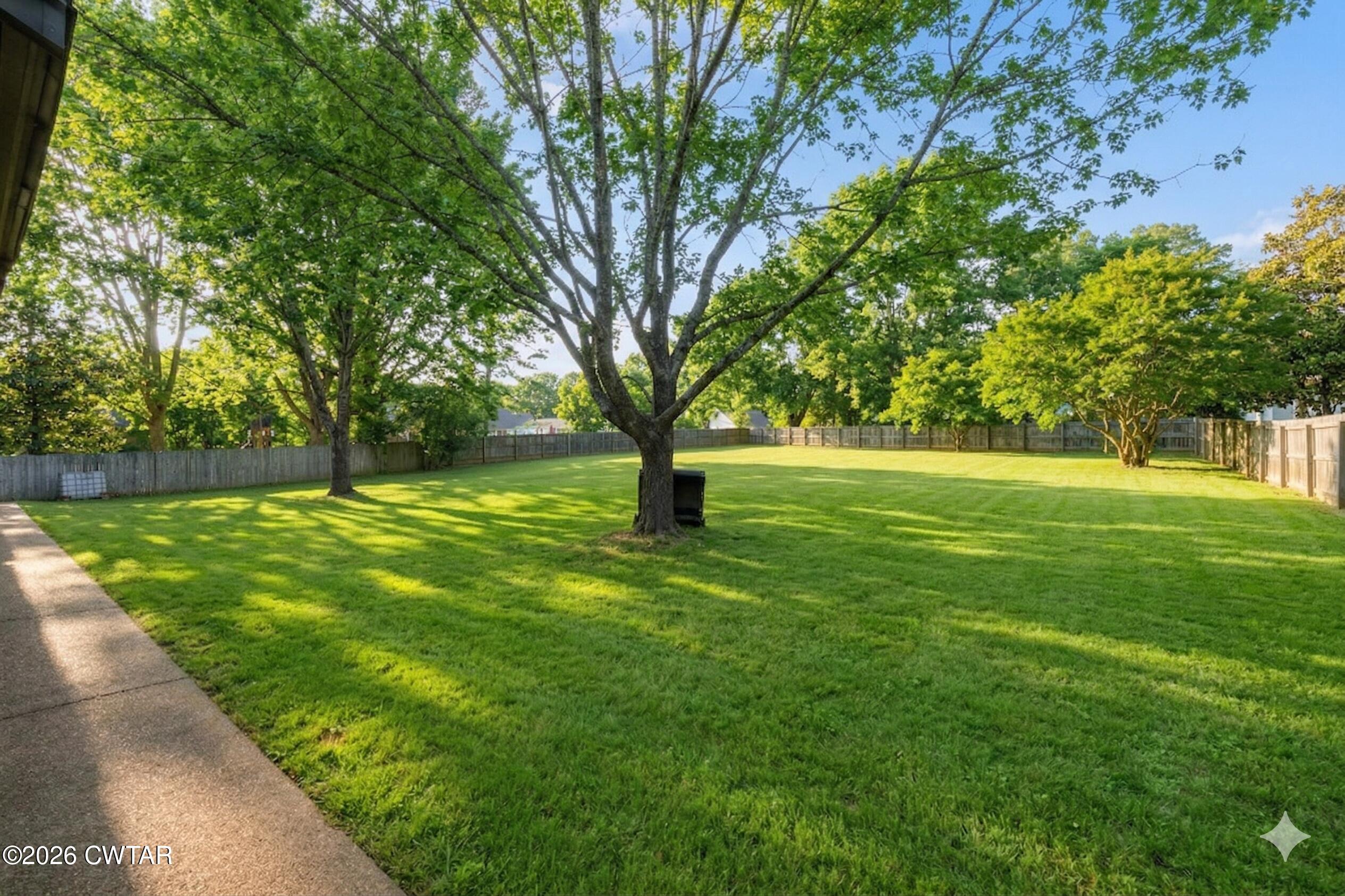 129 Pepper Tree Road Jackson, TN 38305 - Photo 33 of 35 a view of yard with trees
