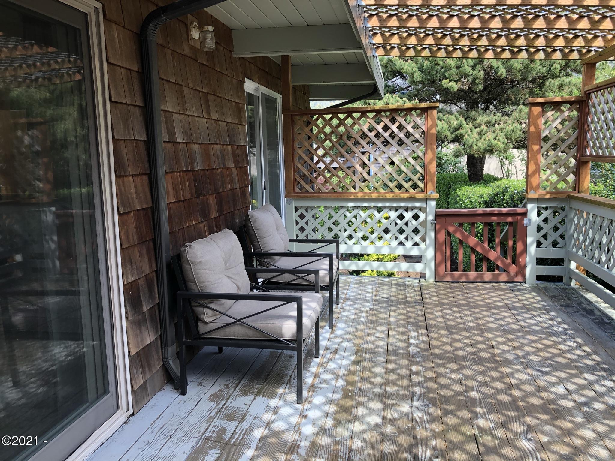 17 Shell Street Yachats, OR 97498 - Photo 31 of 63 Back deck to 2 bedrooms