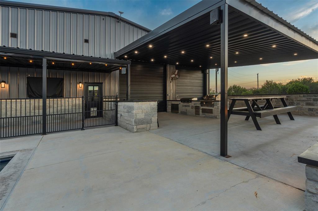 9700 Nix Road Tolar, TX 76476 - Photo 27 of 39 a patio with table and chairs