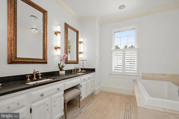a bathroom with a sink and a bathtub