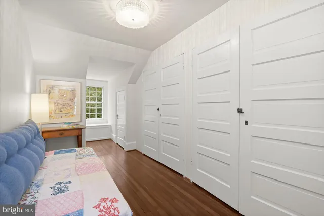 a living room with furniture window and potted plant