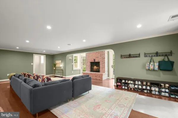 a view of a porch with chairs and table