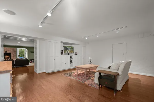 a view of a chair and table in the balcony