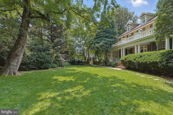 a view of backyard with green space