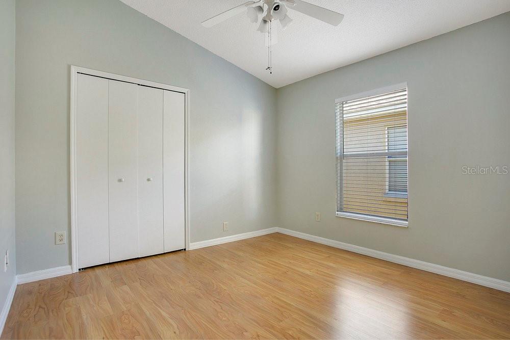 114 Sundance Court Winter Springs, FL 32708 - Photo 11 of 34 a view of an empty room with wooden floor and a window