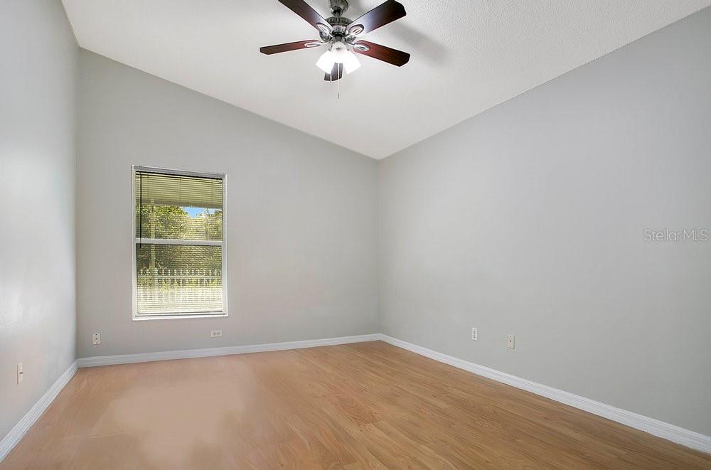 114 Sundance Court Winter Springs, FL 32708 - Photo 15 of 34 wooden floor in an empty room with a window
