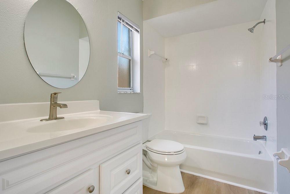 114 Sundance Court Winter Springs, FL 32708 - Photo 17 of 34 a bathroom with a sink a toilet and a mirror