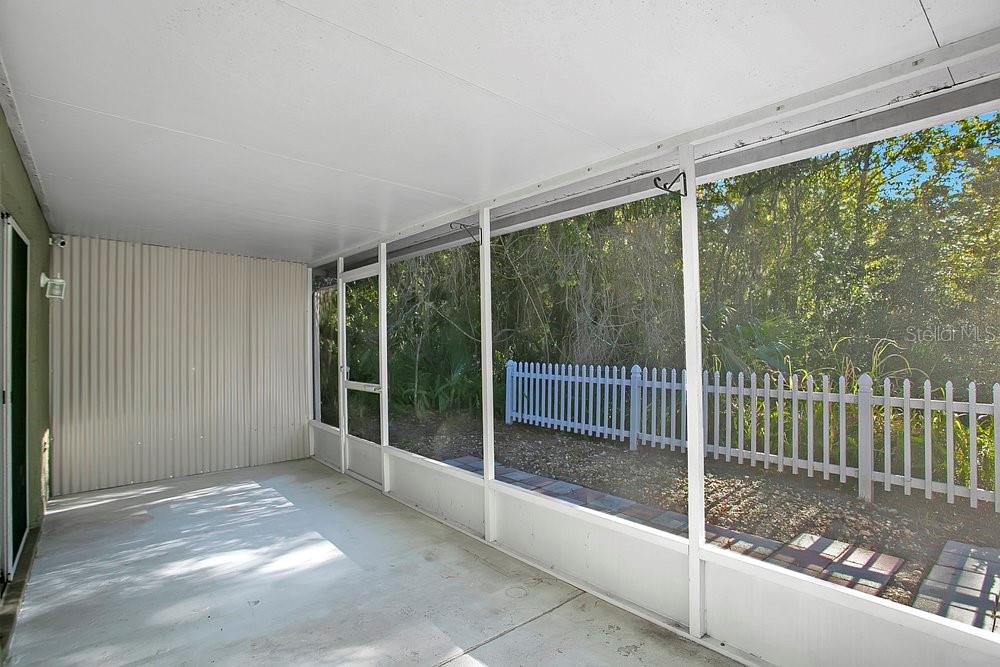 114 Sundance Court Winter Springs, FL 32708 - Photo 20 of 34 a view of an empty room with sliding glass door