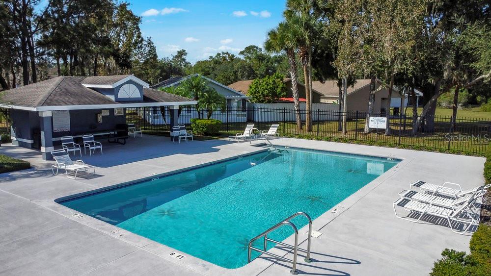 114 Sundance Court Winter Springs, FL 32708 - Photo 31 of 34 an outdoor space with swimming pool and furniture