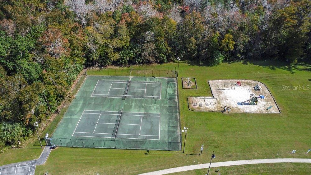 114 Sundance Court Winter Springs, FL 32708 - Photo 32 of 34 a view of a swimming pool with an outdoor space and seating area