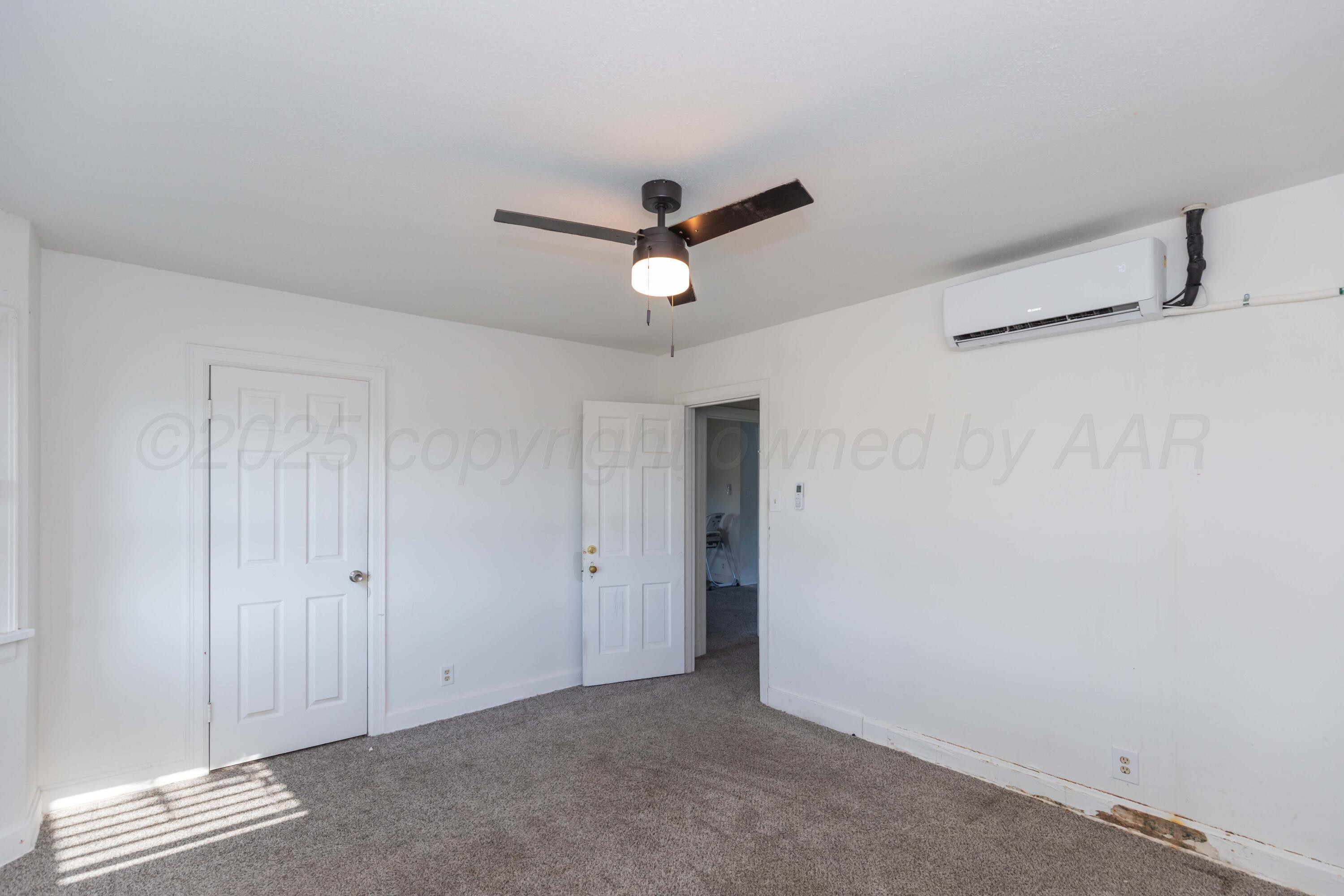 1214 Southwest 12th Avenue Amarillo, TX 79102 - Photo 22 of 25 a view of room with ceiling fan