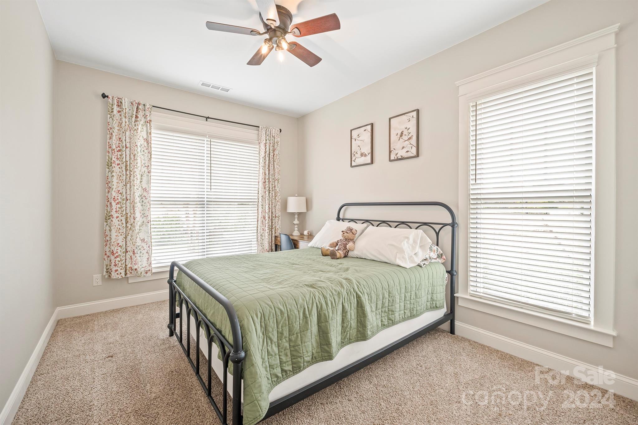 13516 Stumptown Road Huntersville, NC 28078 - Photo 18 of 37 a bedroom with a bed and a window