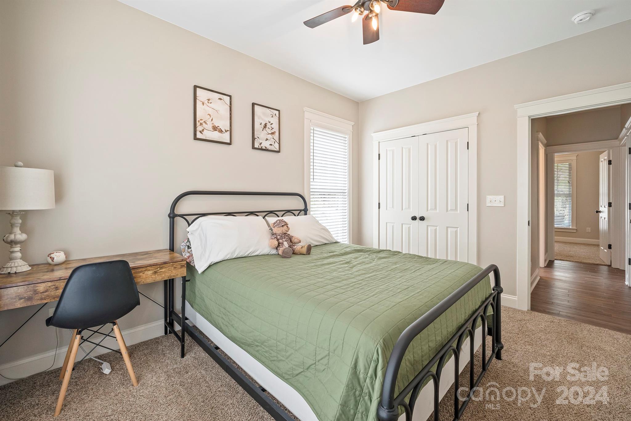 13516 Stumptown Road Huntersville, NC 28078 - Photo 19 of 37 a bedroom with a bed and a chair