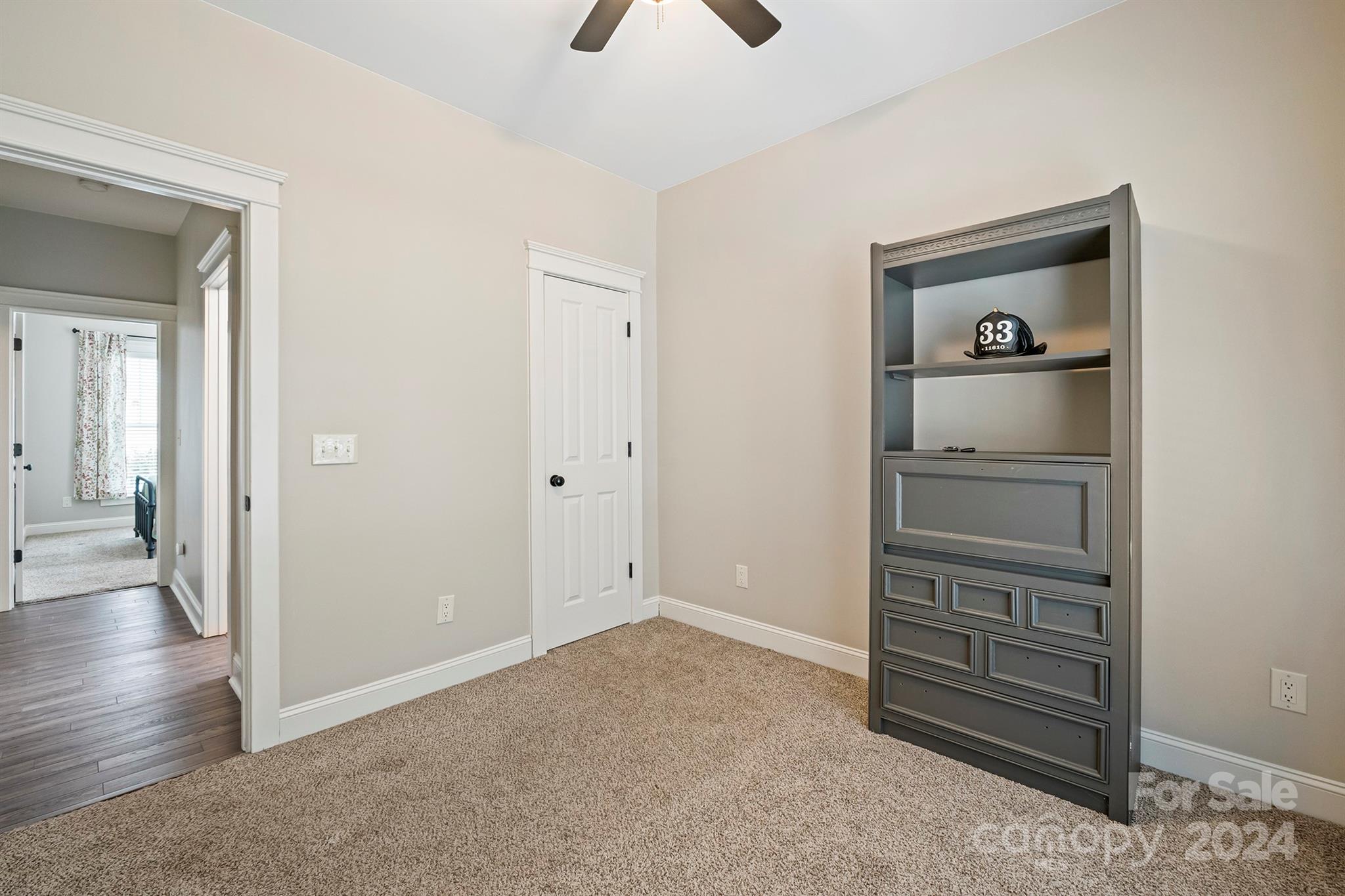 13516 Stumptown Road Huntersville, NC 28078 - Photo 22 of 37 a view of an empty room with a closet
