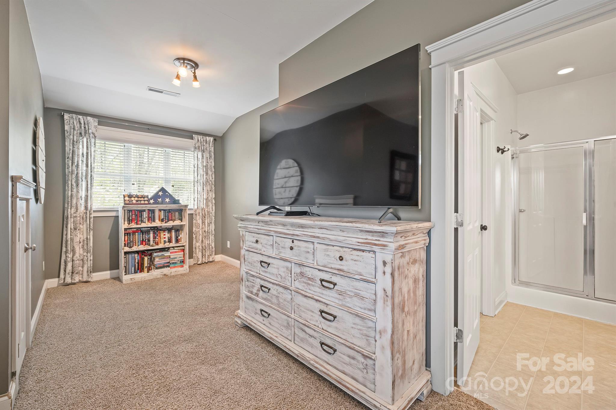 13516 Stumptown Road Huntersville, NC 28078 - Photo 28 of 37 a view of room with cabinet flat screen tv and cabinet