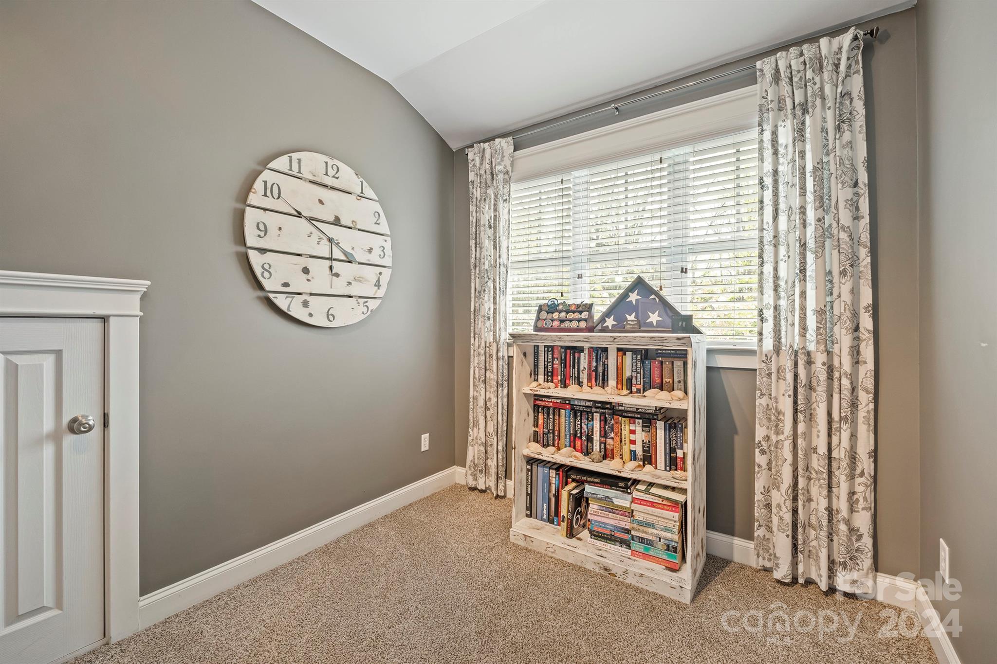 13516 Stumptown Road Huntersville, NC 28078 - Photo 30 of 37 a view of a livingroom with shelves